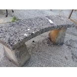 A CONCRETE GARDEN BENCH