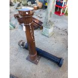 A PAIR OF CAST IRON BOLLARDS