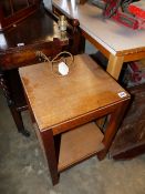 AN ART DECO HALL TABLE WITH LAMP