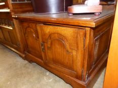 AN OLD CHARM TYPE LOW OAK TV STAND
