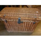 A LARGE WICKER HAMPER