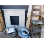 A FIRE SURROUND, TWO SCULLERY STEPS, PANEL DOORS, GALVANISED BUCKETS, ETC.
