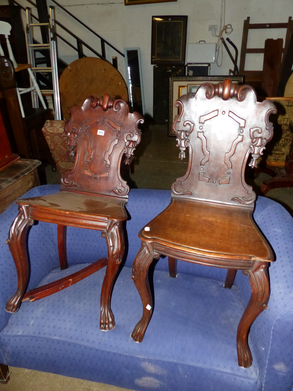 A PAIR OF HALL CHAIRS