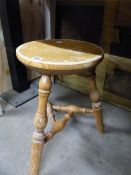 A TURNED LEG STOOL.