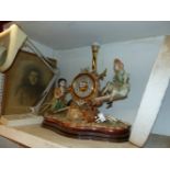 A CHINA CLOCK, CONVEX MIRROR, MAGNIFYING LAMP AND A PRINT. (4)