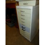 A MULTI DRAWER FILE CHEST CONTAINING NUTS BOLTS AND FIXINGS