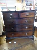 AN ANTIQUE MINIATURE CHEST OF DRAWERS.