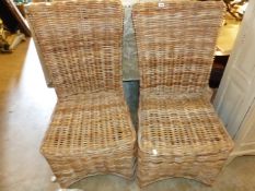 A PAIR OF RATTAN CONSERVATORY CHAIRS