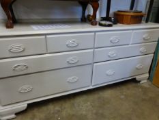 A LARGE MODERN PAINTED MULTI DRAWER SIDE UNIT