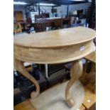 A DEMI LUNE SIDE TABLE