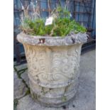 A LARGE RELIEF DECORATED CIRCULAR PLANTER.