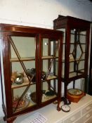 AN EDWARDIAN INLAID DISPLAY CABINET TOGETHER WITH AN OAK DISPLAY CABINET