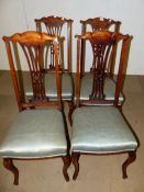 A SET OF FOUR EDWARDIAN DINING CHAIRS