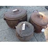 THREE CAST IRON COOKING POTS