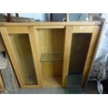 AN OAK DISPLAY CABINET