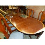 A REGENCY STYLE INLAID DINING TABLE