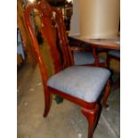 A SET OF SIX QUEEN ANNE STYLE DINING CHAIRS