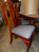 A SET OF SIX QUEEN ANNE STYLE DINING CHAIRS