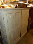 A VINTAGE PAINTED TWO DOOR CABINET