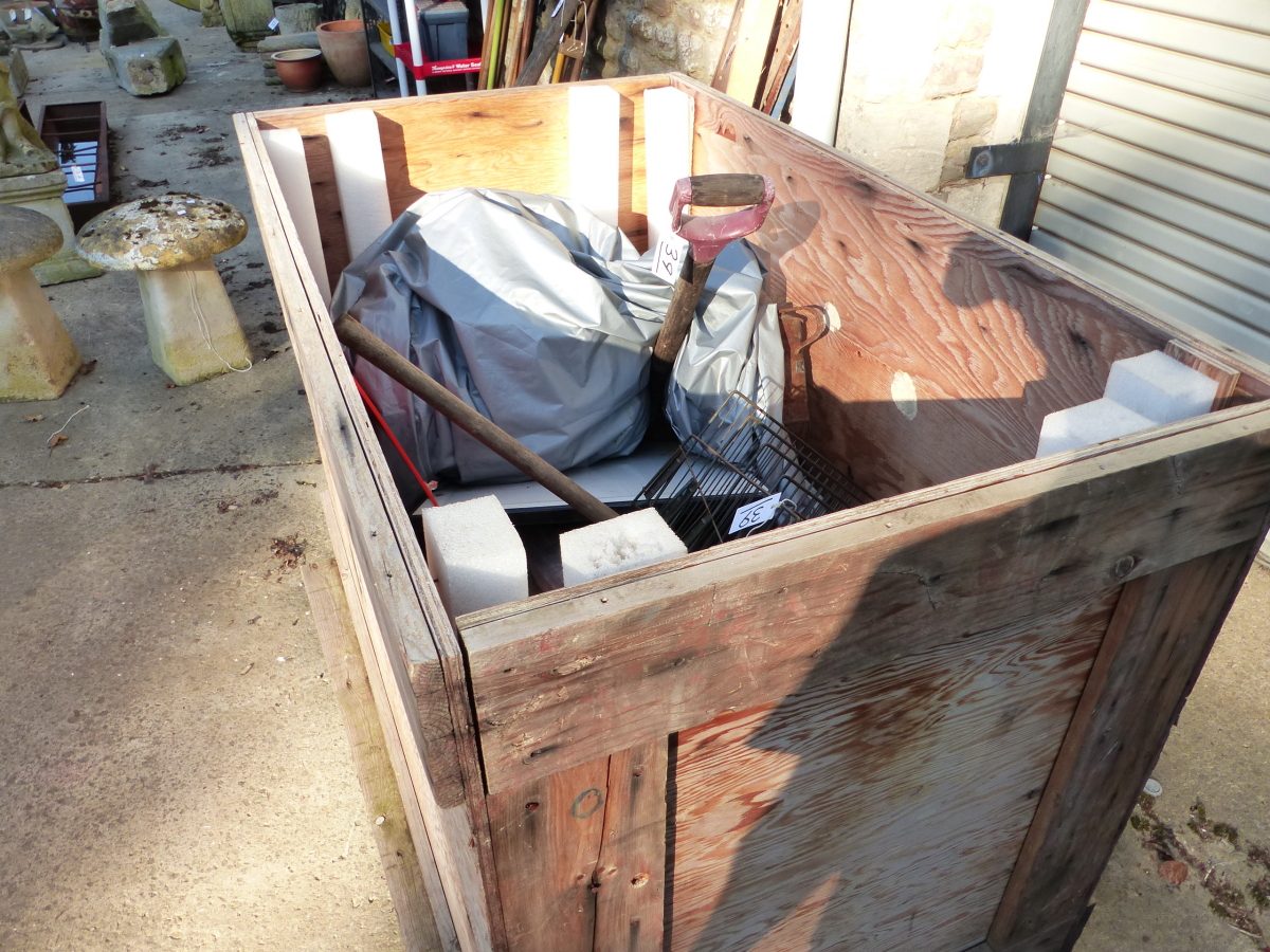 A QUANTITY OF TOOLS ETC IN A LARGE WOODEN CRATE