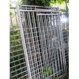 A LARGE METAL DOG RUN CAGE