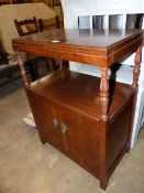 A SMALL MAHOGANY SIDE CABINET