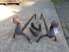 A PAIR OF WROUGHT IRON FIRE DOGS AND A SHOE LAST