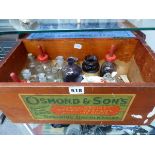 AN OSMONDS OF SPALDING MEDICINE CHEST WITH A SELECTION OF BOTTLES AND A RED CROSS FEEDER