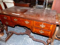 A WALNUT WRITING TABLE. W 120 X D 61 X H 76CMS.