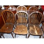 A SET OF SIX SIMILAR WINDSOR SPINDLE BACK CHAIRS.