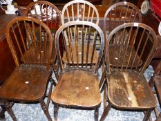 A SET OF SIX SIMILAR WINDSOR SPINDLE BACK CHAIRS.