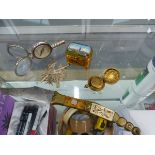 A VINTAGE TRINKET BOX, A BRASS SOVEREIGN CASE, A SPANISH FOLDING KNIFE, MILITARY BADGE ETC.