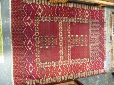 AN ANTIQUE HATCHLI BOKHARA RUG 152 x 120cm