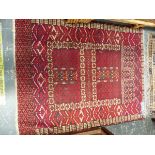 AN ANTIQUE HATCHLI BOKHARA RUG 152 x 120cm