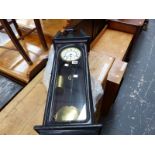 A 19th C. EBONISED VIENNA WALL CLOCK.