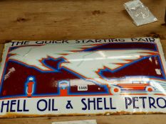 A RARE SHELL OIL & SHELL PETROL, THE QUICK STARTING PAIR, DOMED ENAMEL ADVERTISING SIGN.