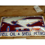A RARE SHELL OIL & SHELL PETROL, THE QUICK STARTING PAIR, DOMED ENAMEL ADVERTISING SIGN.