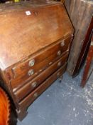 A LATE GEORGIAN MAHOGANY BUREAU OF SMALL SIZE