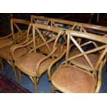 A SET OF SIX BENTWOOD ARMCHAIRS