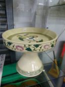 A CHINESE TRUMPET FOOTED SHALLOW BOWL DECORATED WITH PEACHES