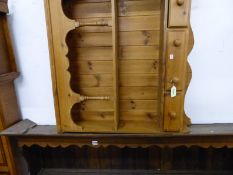 A PINE KITCHEN WALL SHELF AND AN OAK DRESSER RACK