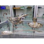 A HALLMARKED SILVER SAUCEBOAT, TWO SMALL CONDIMENT SPOONS AND A TIFFANY SILVER PLATED TAPER