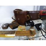 TWO PAIRS OF CASED BINOCULARS, OPERA GLASSES, CHINON MOVIE CAMERA AND A SLIDE RULE
