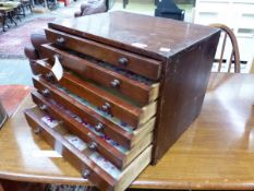 A SIX GRADUATED DRAWER SPECIMEN CHEST