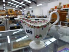 AN EARLY ENGLISH CHINA SAUCEBOAT.