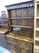 A BESPOKE 18th C. STYLE OAK DRESSER. W 109 X D 47 X H 187CMS.