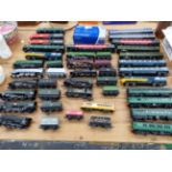 A COLLECTION OF OO GAUGE ELECTRIC LOCOMOTIVES AND CARRIAGES BY HORNBY AND OTHERS