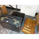 A FOUR DRAWER SUIT CASE, CASED IMPIAL TYPEWRITER AND A PULL ALONG CART OF WOODEN BRICKS