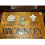 A VINTAGE BRONNLEY SOAP WOODEN ADVERTISING BOARD WITH ROYAL WARRANT.