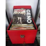 A RED CASE OF 45 RPM SINGLE RECORDS